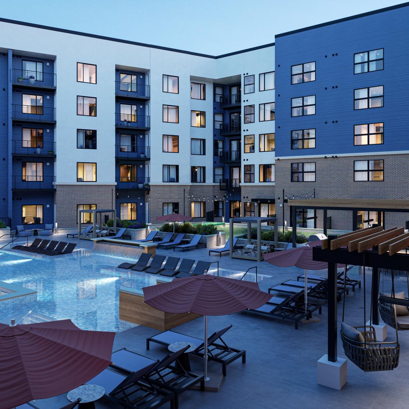 The Wade A serene park pool surrounded by lush greenery, inviting visitors to relax and enjoy the tranquil atmosphere.