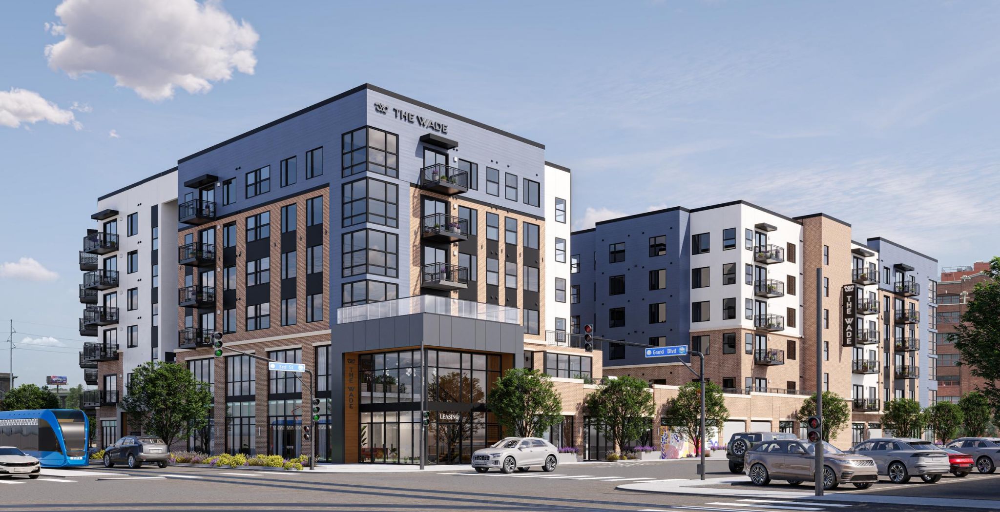 The Wade Visual representation of a new downtown apartment complex, featuring sleek design and surrounding cityscape.