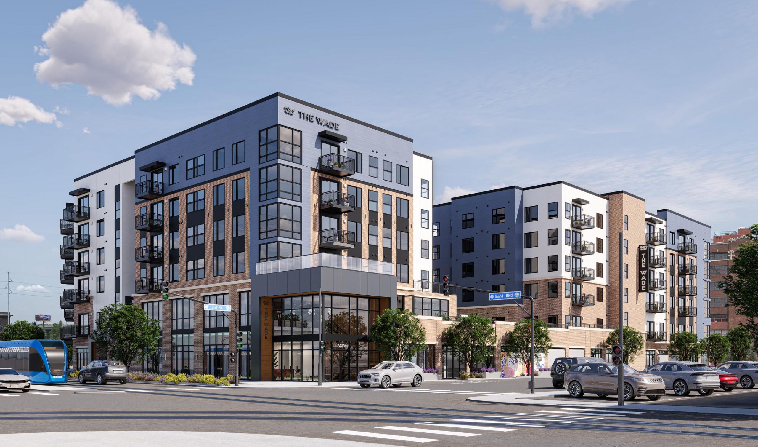 The Wade Visual representation of a new downtown apartment complex, featuring sleek design and surrounding cityscape.